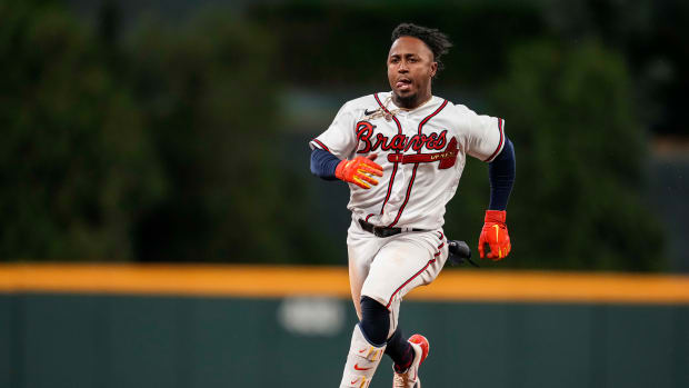 Apr 24, 2023; Cumberland, Georgia, USA; Atlanta Braves second baseman Ozzie Albies (1) runs the bases after hitting a three run triple against the Miami Marlins during the eighth inning at Truist Park.